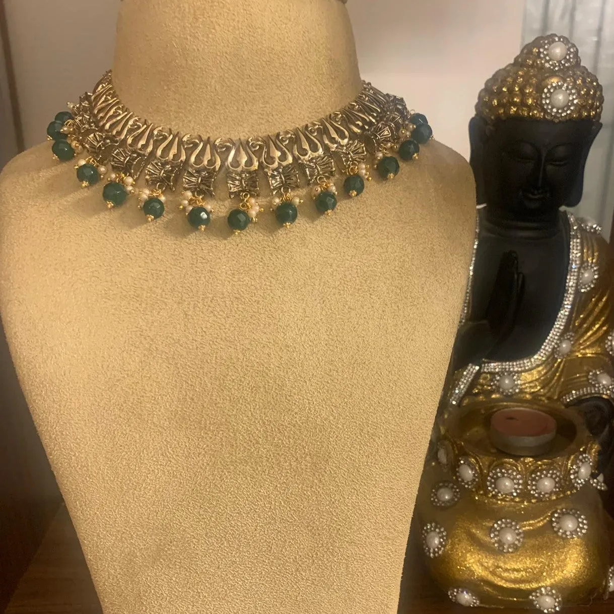 Estele Gold Plated Antique Heavenly Thrishul & Damru Chocker Necklace Set with Green Beads for Women