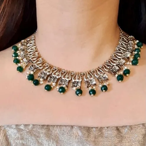 Estele Gold Plated Antique Heavenly Thrishul & Damru Chocker Necklace Set with Green Beads for Women